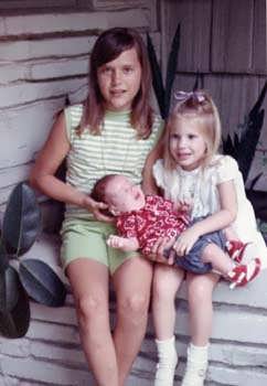 1969 Carolyn and Sallie hold Charles!
